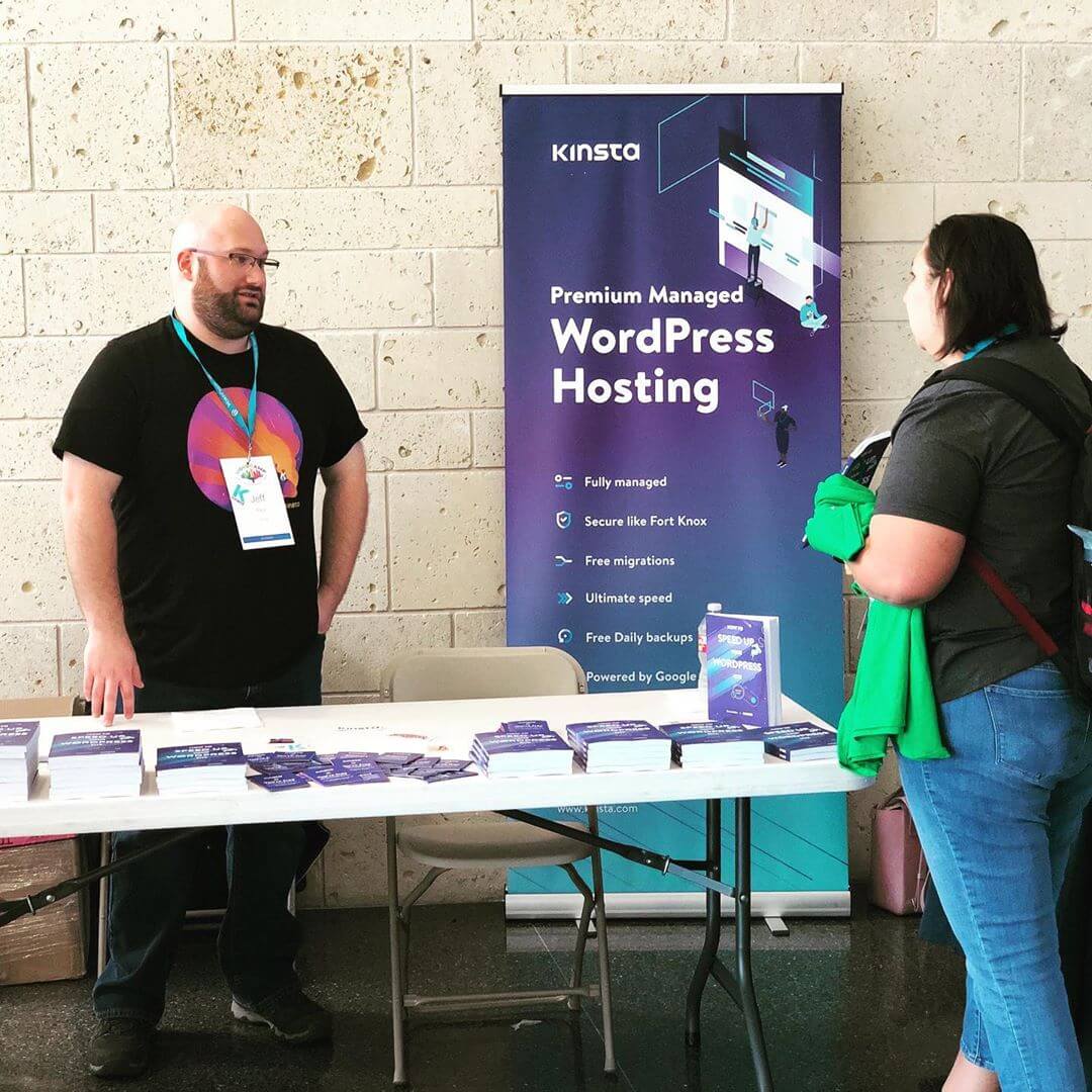 The Kinsta booth at WordCamp Dallas